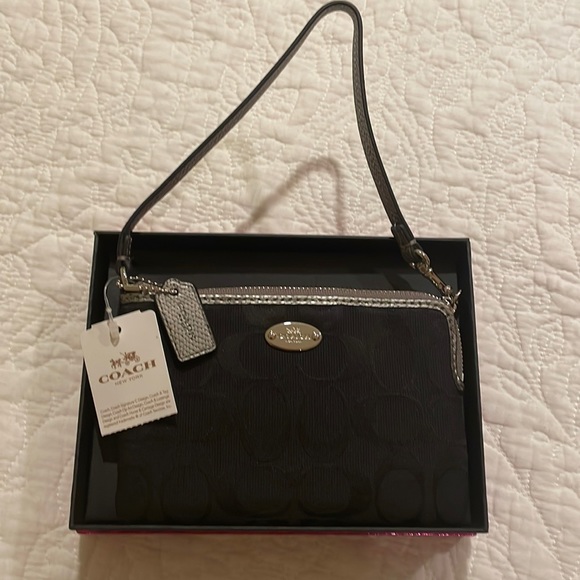 Coach Accessories - NEW Black Coach wristlet with tags and original box